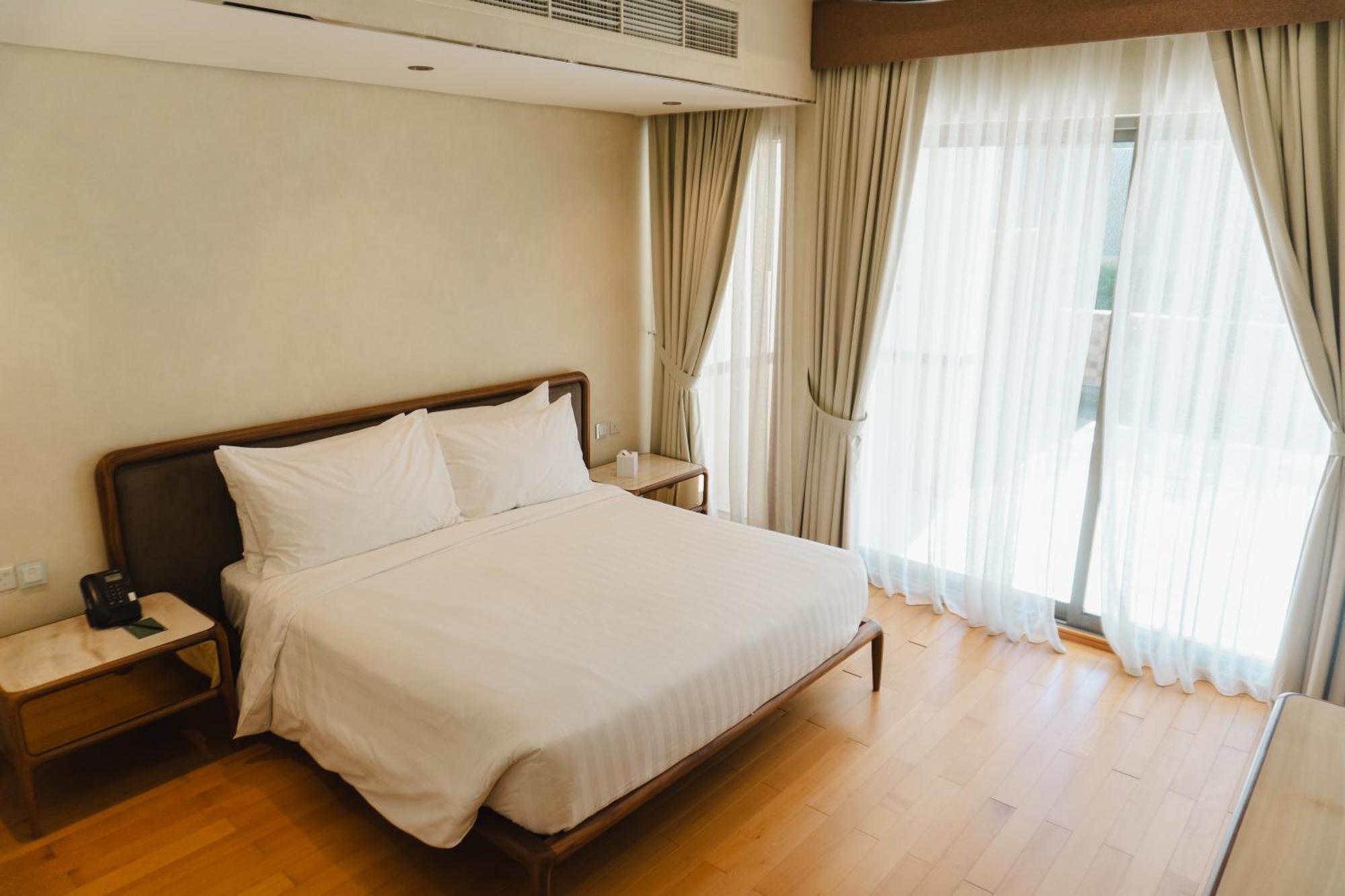 Palavra Resort Al-Manamah Bagian luar foto A bedroom at the hotel