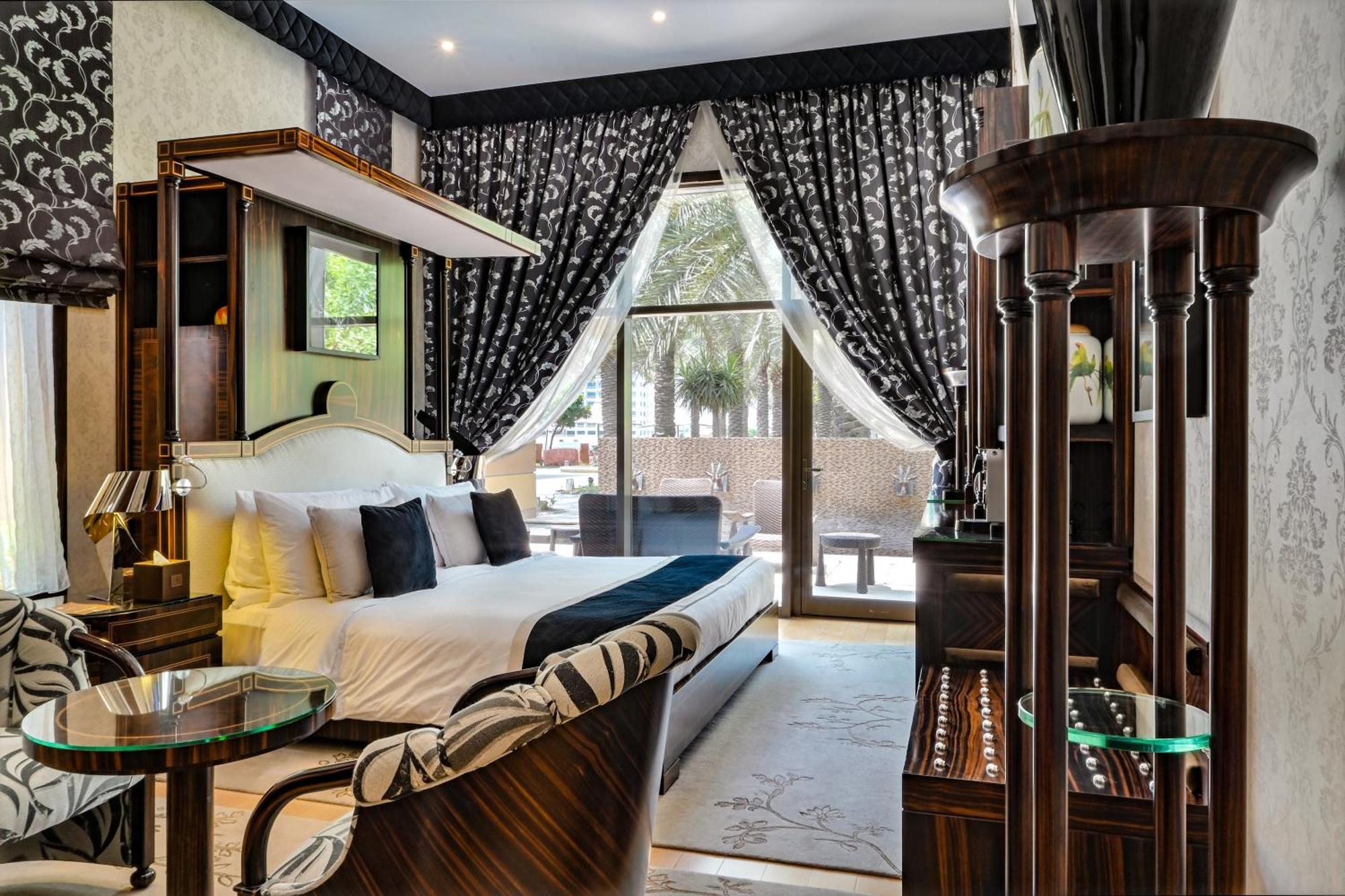 Palavra Resort Al-Manamah Bagian luar foto A bedroom at the hotel